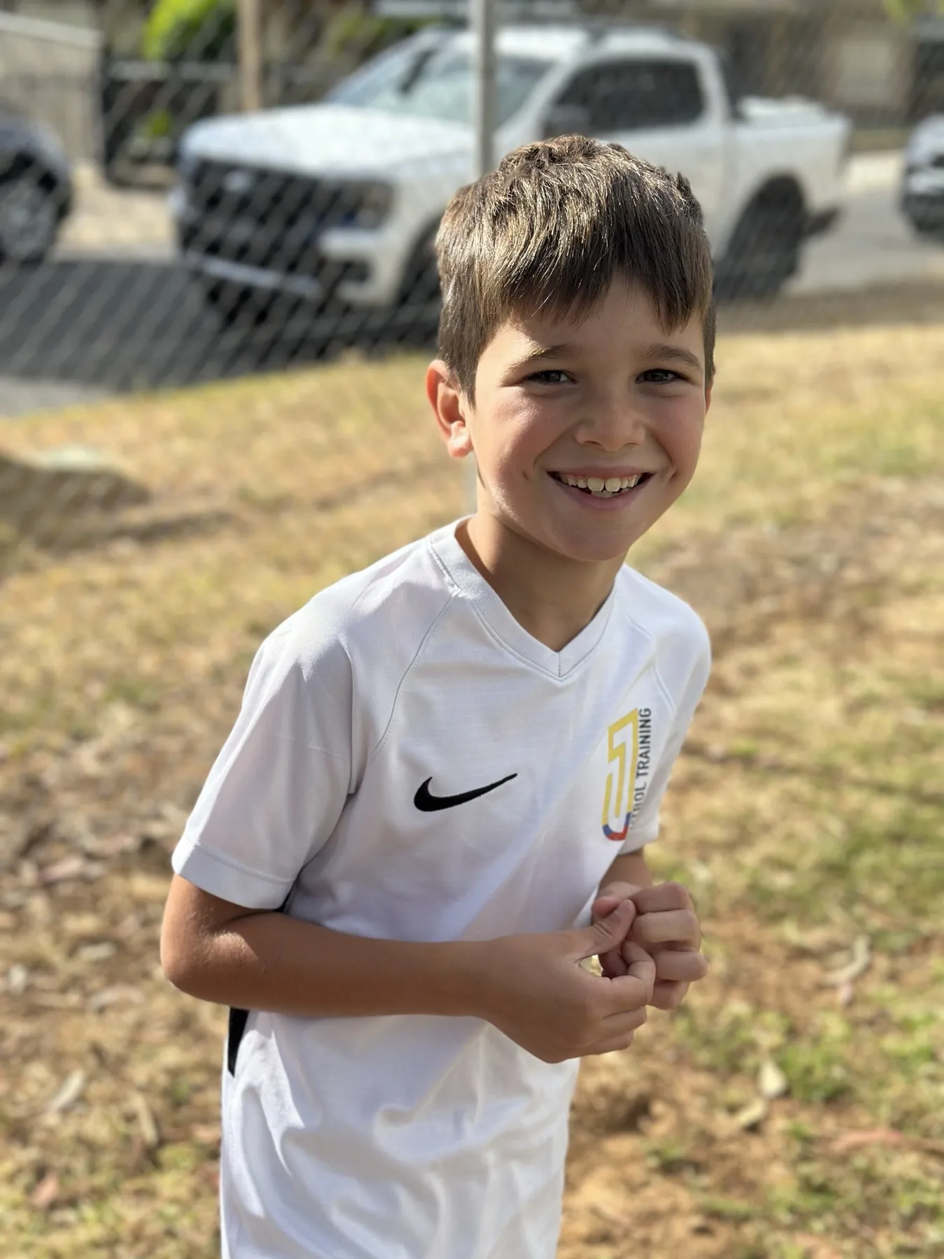 A smiling young player